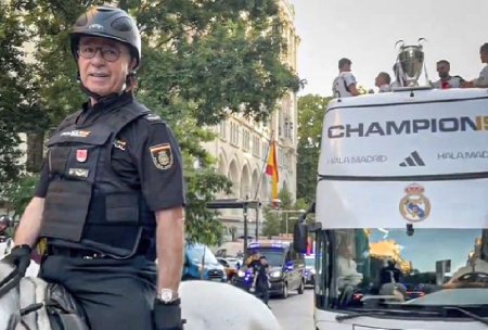 Imagini virale in Spania » S-a aflat abia acum: cine e politistul care a escortat autocarul Realului la petrecerea de pe strazile Madridului
