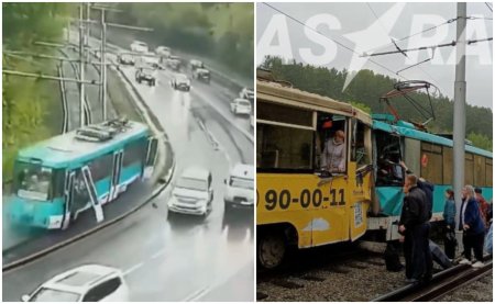 Un tramvai scapat de sub control a aruncat intr-o <span style='background:#EDF514'>CURBA</span> pasageri in fata masinilor, apoi s-a ciocnit de alt tramvai, in Rusia. Un mort si peste 90 de raniti