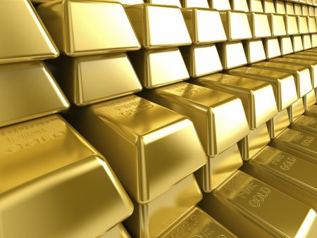 Maxim istoric de pret, pe uncia de aur. Metalul galben s-a vandut cu 2.427 dolari, in luna mai