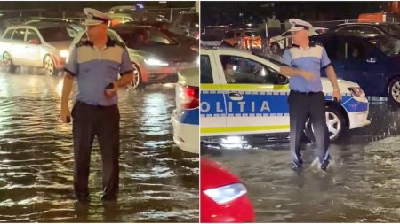 El este seful politistilor rutieri din Bucuresti. Cu apa pana la genunchi, in mijlocul <span style='background:#EDF514'>INTERSECTIE</span>i, ajutandu-i pe soferii blocati in trafic dupa furtuna