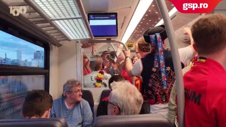 Fanii Belgiei au facut show in tren, in ciuda infrangerii