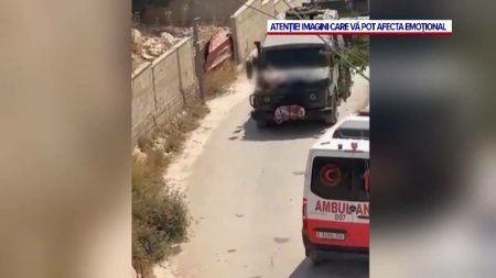 Noi imagini revoltatoare din Orientul Mijlociu. Un palestinian ranit a fost plimbat ca un trofeu pe capota unei masini