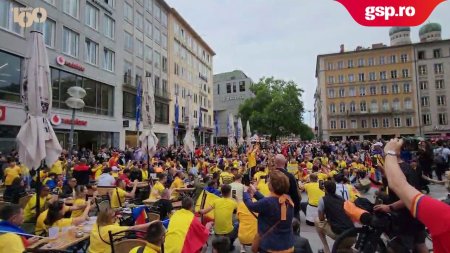 Fanii nationalei s-au adunat in piata Marienplatz din Munchen inainte de meciul cu Olanda. Suporterii tricolori au cantat la un<span style='background:#EDF514'>ISON</span>: Romania, ale, Romania, ale!