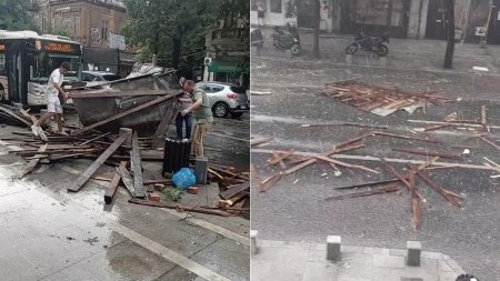 Furtuna cu grindina a facut prapad in Bucuresti, in doar cateva minute: Copaci si acoperisuri smulse de vant au cazut pe masini aflate in mers