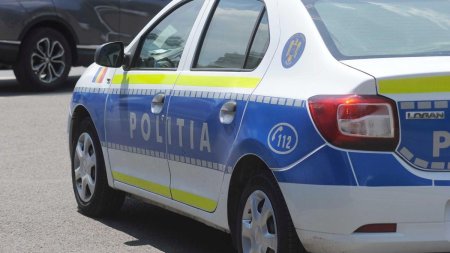 Un sofer a trecut cu roata masinii peste piciorul unui politist local