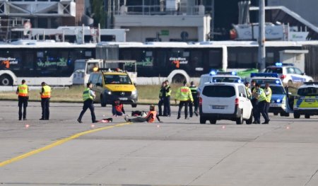 <span style='background:#EDF514'>AEROPORTUL</span> din Frankfurt a suspendat temporar zborurile, din cauza unui protest al activistilor pentru clima