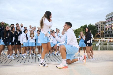 Un sportiv argentinian si-a cerut in casatorie iubita, aflata si ea in delegatia de la JO 2024, la <span style='background:#EDF514'>FOTOGRAFIA</span> de grup din Satul Olimpic