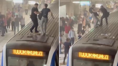 Momentul in care un barbat se urca pe metrou, la statia Victoriei. Alt individ a folosit extinctorul in tren, la statia Piata Romana