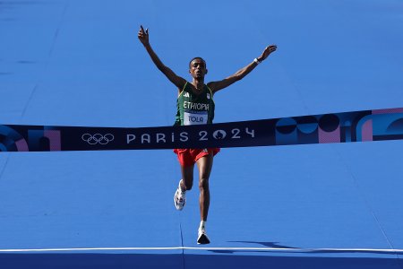 Un etiopian a cucerit aurul la maraton cu nou record olimpic