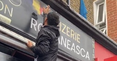 De teama protestelor, proprietarul unei frizerii din Londra a sters drapelul Romaniei si inscriptia 