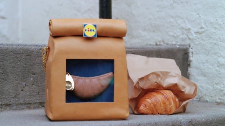 <span style='background:#EDF514'>LIDL</span> si un designer de renume lanseaza o geanta croissant in scop caritabil