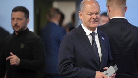 Scholz vrea sa ramana in istorie drept 