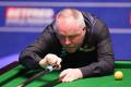 John Higgins, al doilea jucator din istorie care reuseste 1000 de break-uri de peste 100 de puncte, dupa Ronnie O'Sullivan