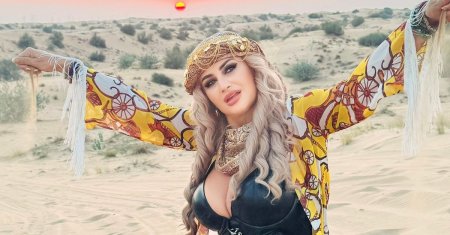 Julia Chelaru a facut furori pe plajele din Dubai! Cu cine a plecat blonda cu sanii voluptuosi in vacanta? 