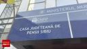 Perchezitii la Casa de pensii din Sibiu. Un functionar si un paznic sunt acuzati de luare de mita si trafic de influenta