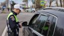 Doi tineri din Brasov au oferit mii de euro mita politistului care ii oprise in trafic