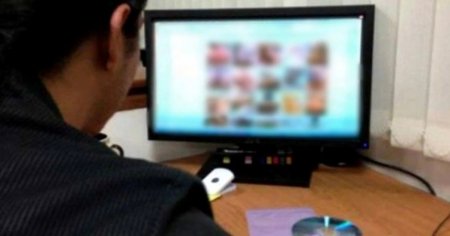 Doi romani au fost arestati pentru distribuire de pornografie infantila cu continut explicit. Cea mai mica dintre victime are doar trei luni