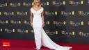 Pamela Anderson, fara machiaj la Premiile BAFTA 2025. A reusit sa iasa in evidenta <span style='background:#EDF514'>PURTAN</span>d o tinuta simpla si eleganta. FOTO