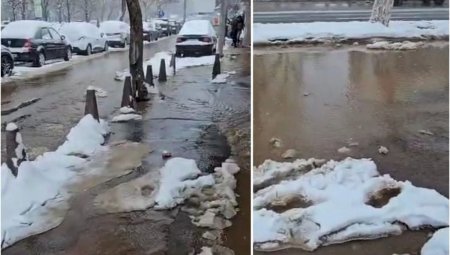 Strada din Bucuresti, inundata dupa ce tot orasul a fost acoperit de un strat gros de zapada