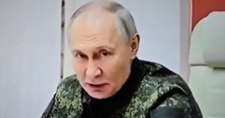 Putin, in vizita in zona de razboi, pentru prima data de la invazia Ucrainei. S-a imbracat in tinuta <span style='background:#EDF514'>MILITAR</span>a de camuflaj