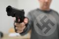 Joaca de-a nazistii in Romania. Amenintari cu pistolul la tampla sau cu decapitarea, ignorate de autoritati pe motiv ca anchetele costa prea mult