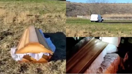 Sicriul cu un barbat mort, abandonat pe camp dupa ce dricul n-a mai putut inainta prin noroi