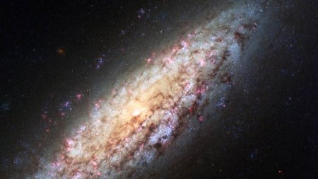 Oamenii de stiinta descopera cea mai mica galaxie vazuta vreodata